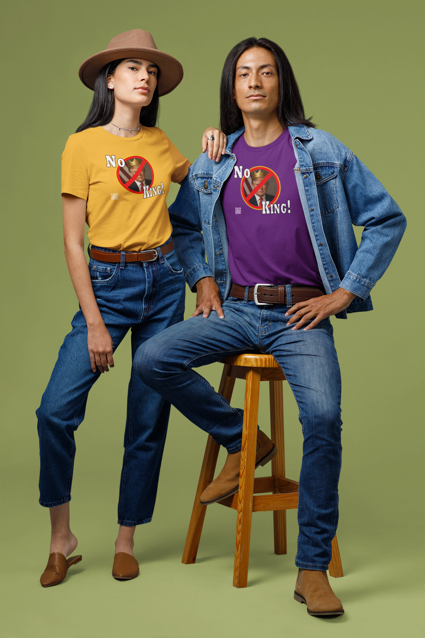 Two models wearing No King Activist TShirts, one in yellow and one in purple, against a green background.
