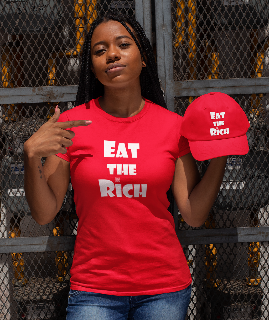 Model wearing a red EAT THE RICH t-shirt holding a red EAT THE RICH Embroidered Dad Hat.
