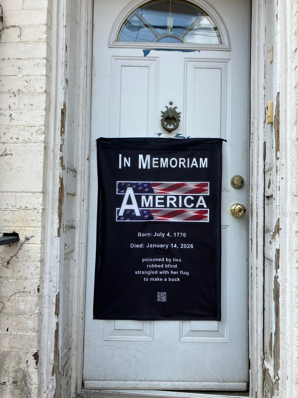 In Memoriam-American Democracy 1776 to 2026 Vertical Protest Banner displayed on a door.