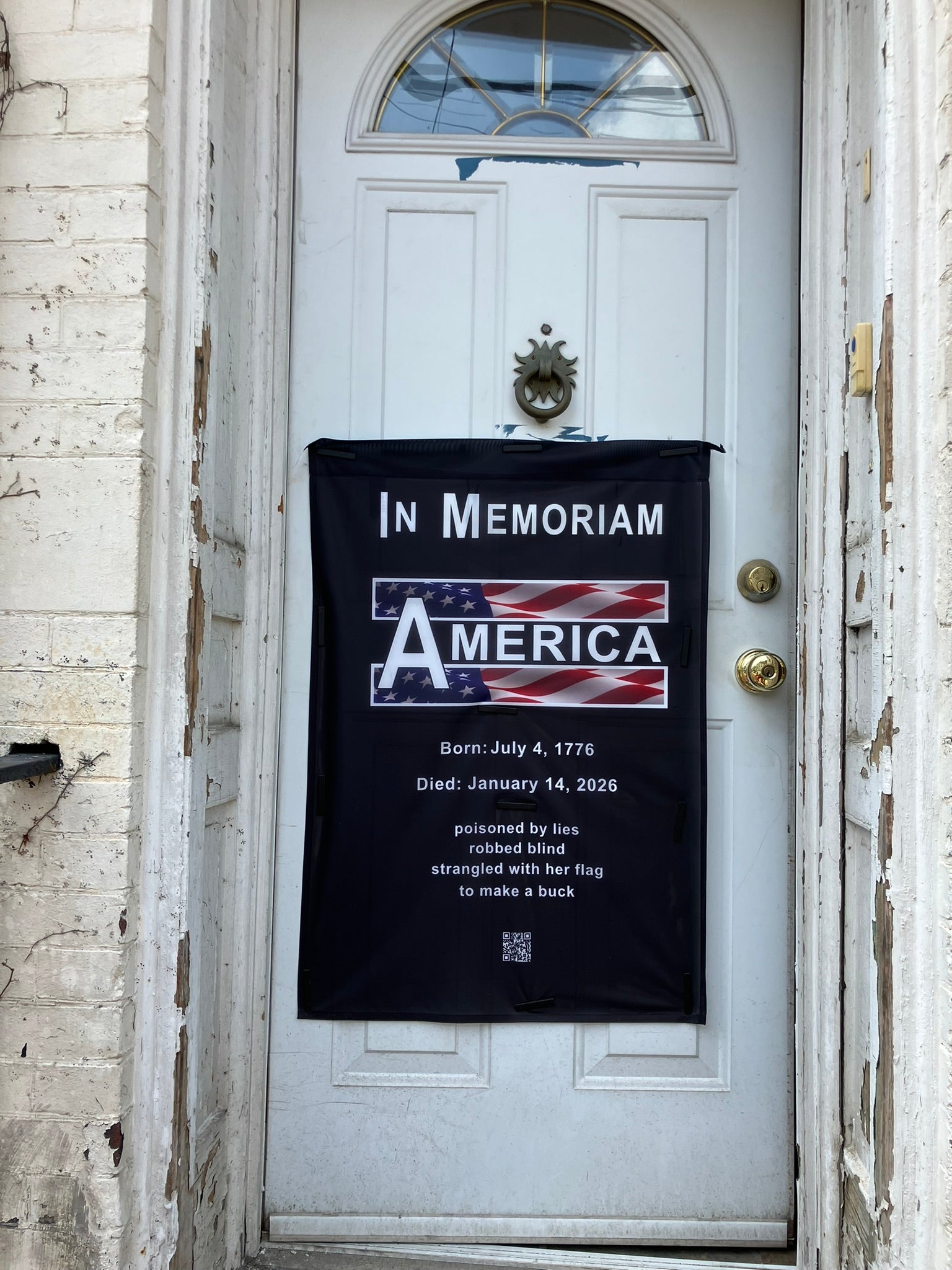 In Memoriam-American Democracy 1776 to 2026 Vertical Protest Banner displayed on a door.