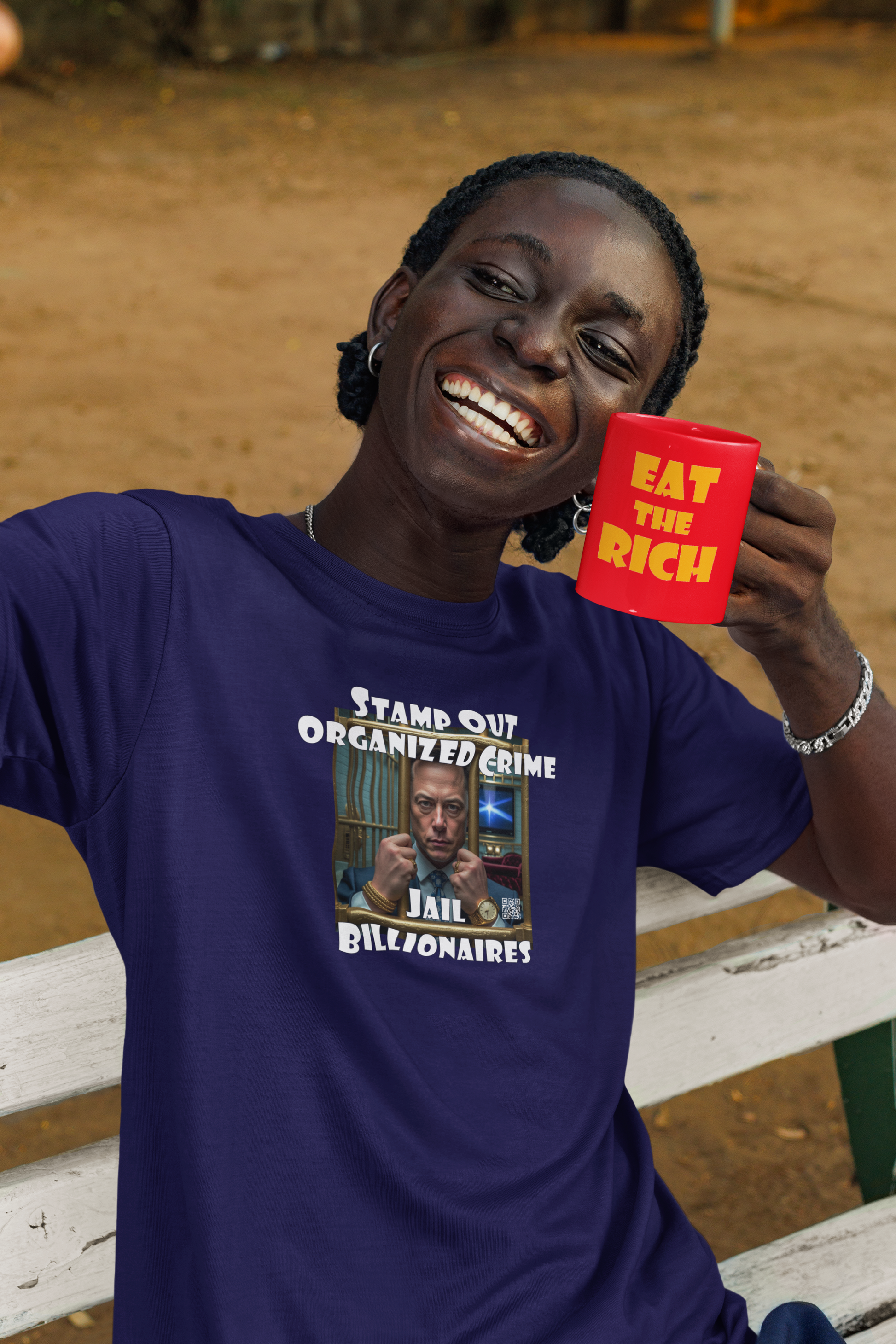 White EAT THE RICH 11oz Ceramic Mug held by a person wearing a blue shirt with a bold statement design.