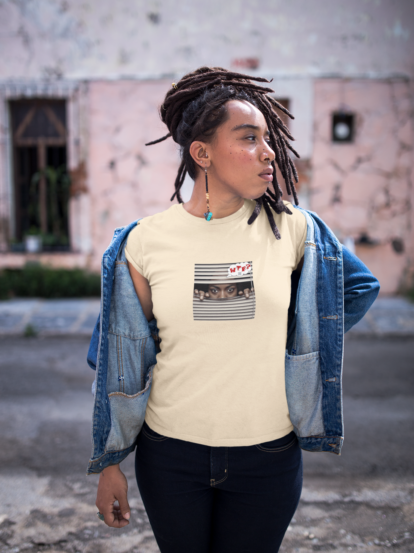 WTF Activist T-Shirt Black Female Model worn by a young woman outdoors, showcasing bold graphic design and personal style.