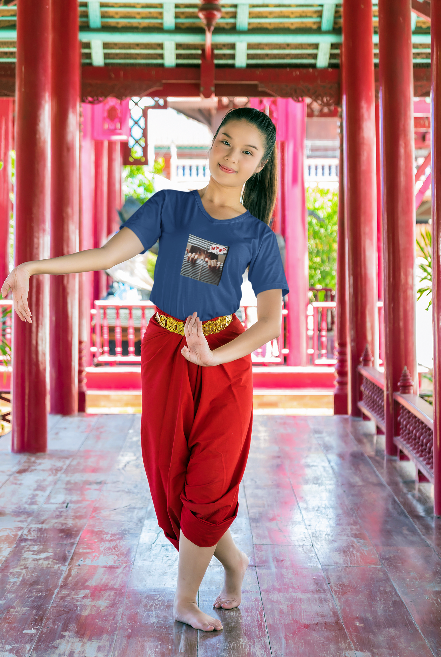 WTF activist t-shirt Asian female model posing in a traditional setting with vibrant colors.