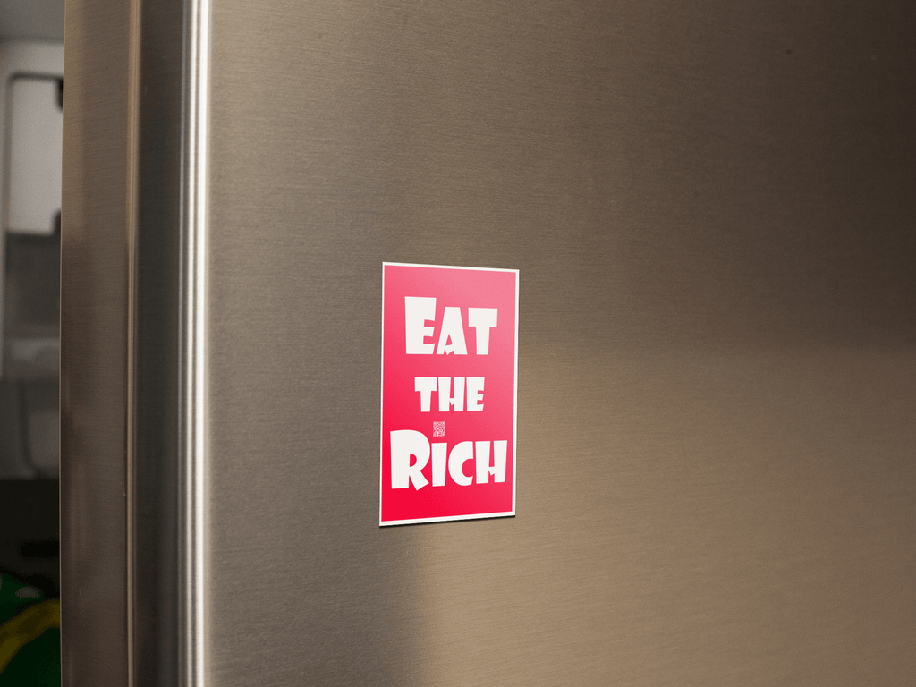4" x 5" red magnet with white Eat the Rich lettering, on the door of a stainless steel refigerator door