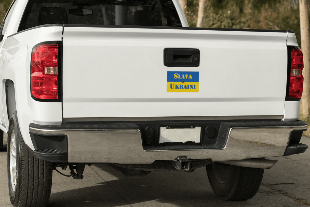 Slava Ukraini magnet displayed on the back of a white pickup truck, symbolizing support for Ukraine.