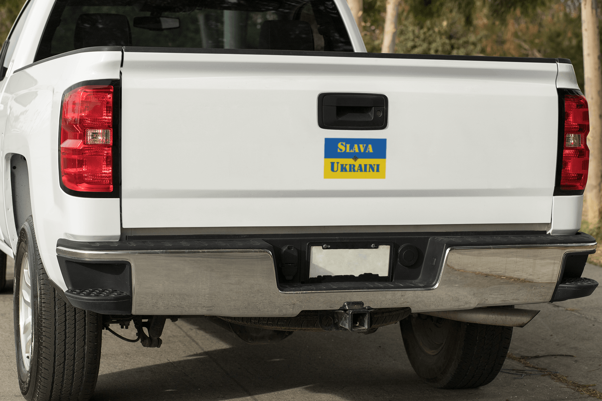 Slava Ukraini magnet displayed on the back of a white pickup truck, symbolizing support for Ukraine.